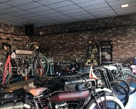 New Showroom 2022 2022-02-05 5949 More early original Indian motorcycles are displayed on the window side.