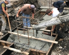 New Showroom Provicence 2017 IMG_5556 Cement is poured to the required depth.