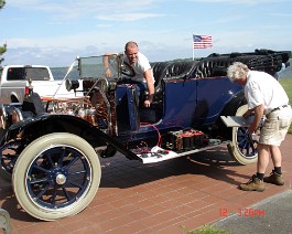 DSC02173 Sean and Chris Brayton making final preparations to the 1912 Cadillac Model 30 two days before the show.