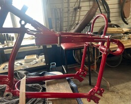 1915 Indian V-Twin 2025-05-24 1720 Left side leaf springs and complete rear swing arm assembly attached.